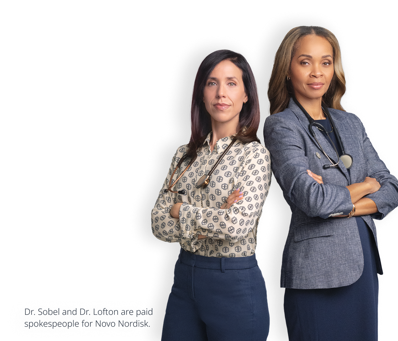 Dr. Sobel and Dr. Lofton standing back-to-back